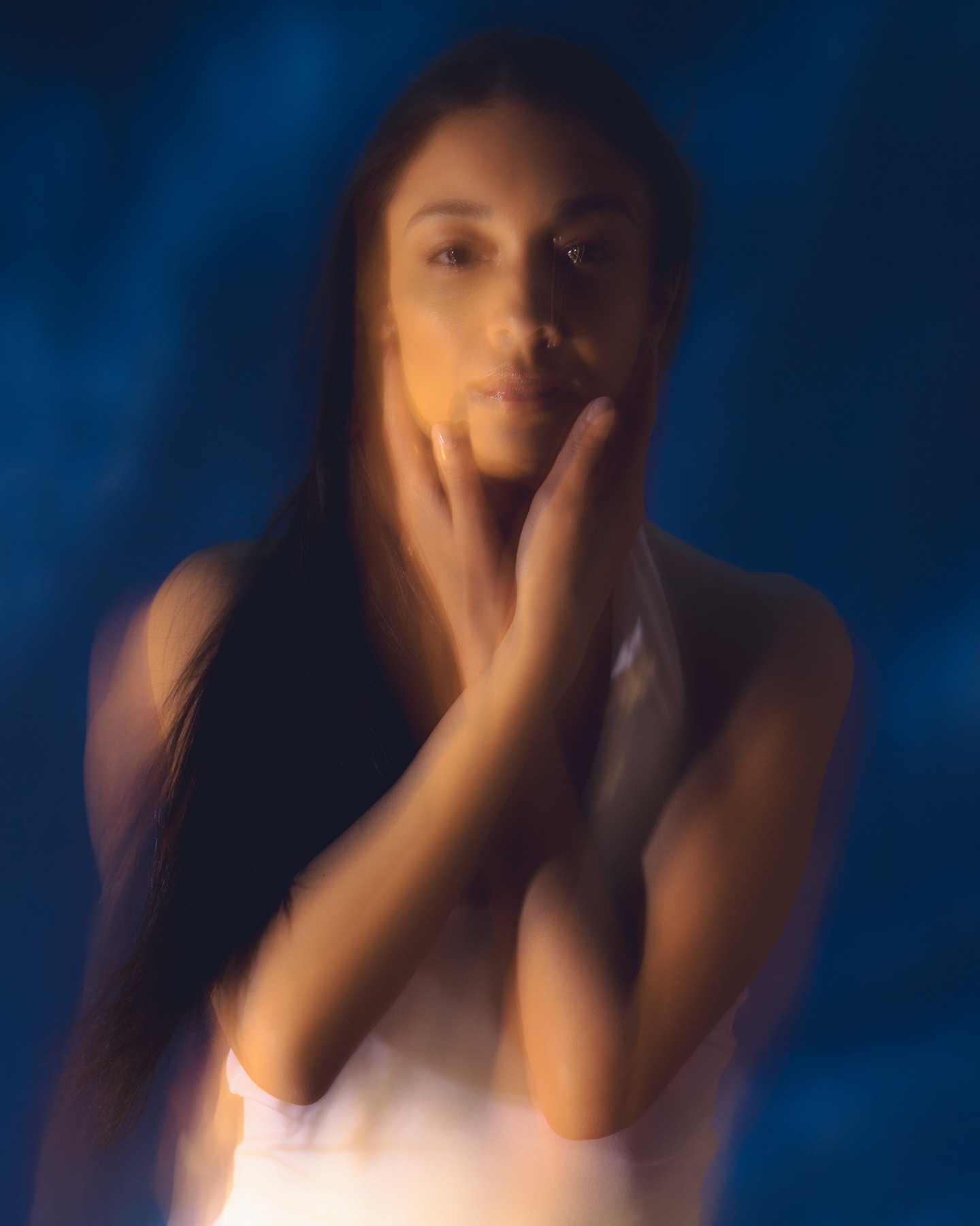 Portrait of Shivani against deep blue